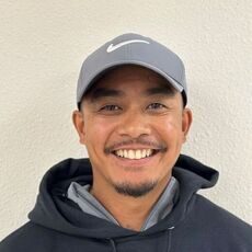 Man in hoodie with gray cap