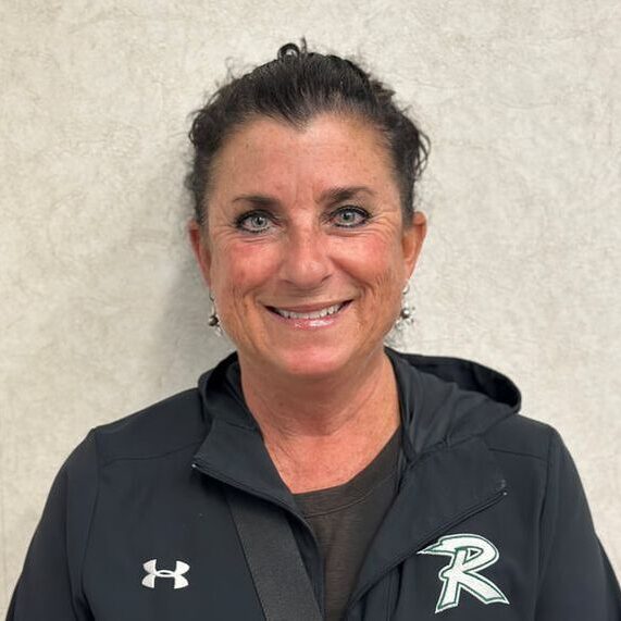 Smiling woman in sports jacket